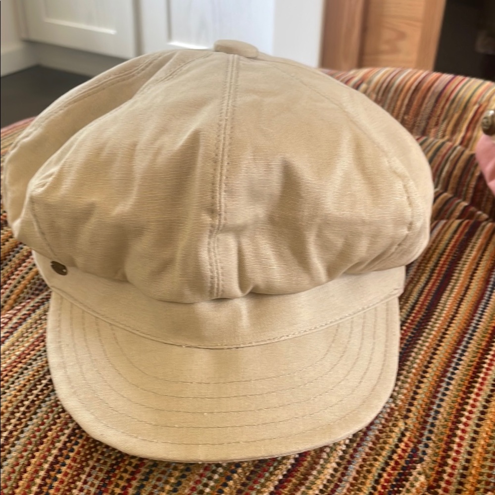 Tan Newsboy Hat with Curved Brim and Textured Finish